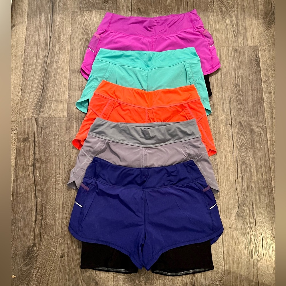 Athleta 2 in 1 spandex running shorts set of 5